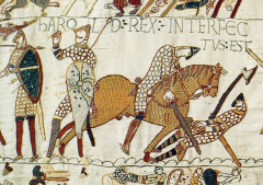 Harald Goodwinson prøver å trekke ut pilen som har truffet ham i øyet. Dette blir hans banesår. Fra Bayeux-teppet. Kilde: Wikipedia London, Museum of London, British Museum, romerne, middelalder, historisk, Unescos liste over Verdensarven, Tower, England Storbritannia