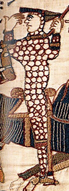 William Bastarden åpner hjelmen for å vise at han er i live etter slaget ved Hastings. Fra Bayeux-teppet. Kilde: Wikipedia Norwich, East Anglia, anglo saxons, angelsaksere, England, Storbritannia, Wensum, Tombland, Norwich Cathedral, Dragon Hall, bosses, St Peter Mancroft, Elm Hill, Norwich Castle Mound, Castle museum, The Bridewell, The Museum of Norwich at The Bridewell, Pottergate, Pull’s Ferry, Cow Tower, Guildhall, Princes Street, Maid’s Head, Bishop’s Bridge, Riverside